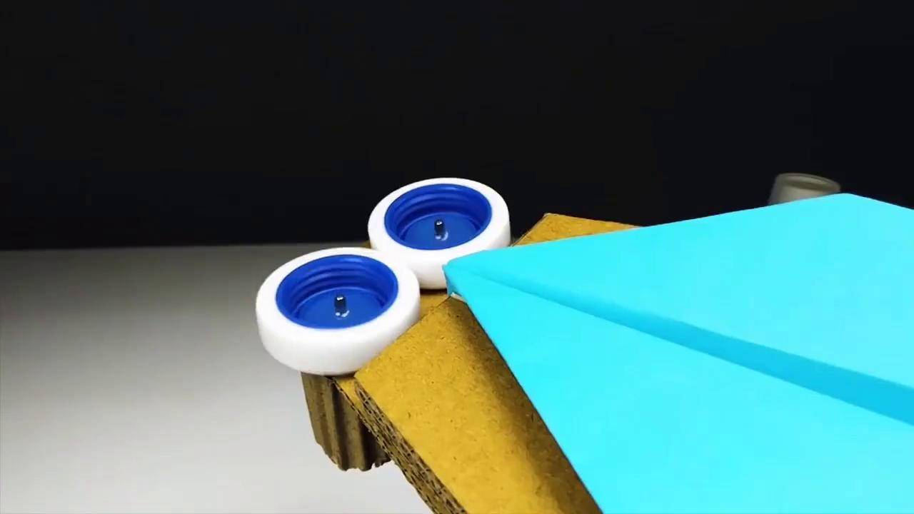 纸飞机发射器怎么折不用皮筋-怎么用纸折纸飞机发射器不用胶水
